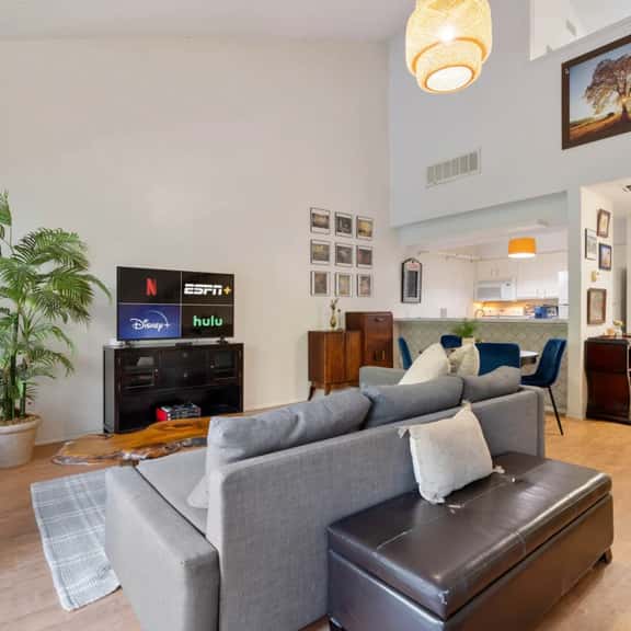 Waterfront Loft w/ Pool + Park Views and Balcony - Image 1