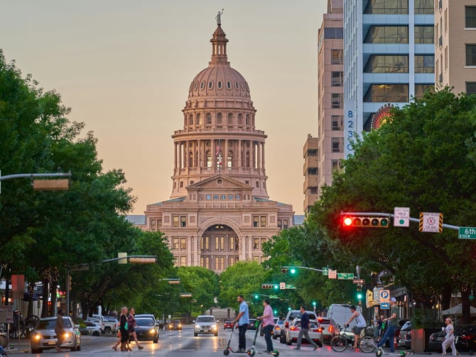 Texas State Capitol at golden hour down Congress Avenue, Austin